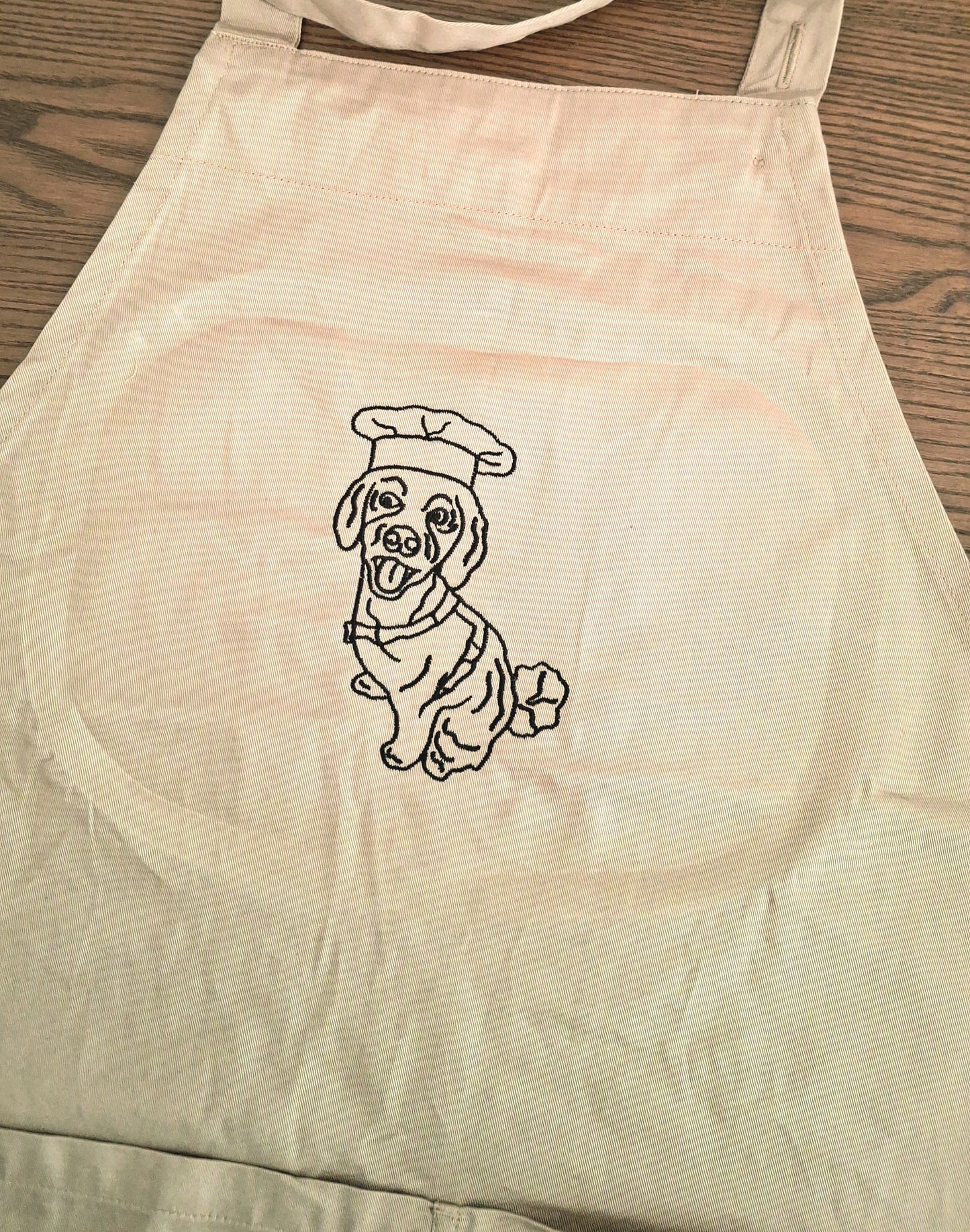 Geborduurde kookschort